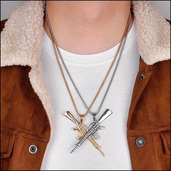 Bold Gold Tone Rifle Pendant Necklace